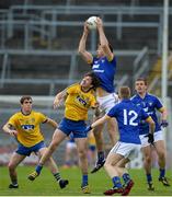 23 July 2016; Gary Brennan of Clare in action against David keenan of Roscommon during the GAA Football All-Ireland Senior Championship, Round 4A, game between Clare and Roscommon at Pearse Stadium in Salthill, Galway. Photo by Brendan Moran/Sportsfile