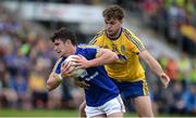 23 July 2016; Cian O'Dea of Clare in action against Ultan Harney of Roscommon during the GAA Football All-Ireland Senior Championship, Round 4A, game between Clare and Roscommon at Pearse Stadium un Salthill, Galway. Photo by Brendan Moran/Sportsfile