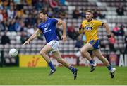 23 July 2016; Gary Brennan of Clare in action against Thomas Corcoran of Roscommon during the GAA Football All-Ireland Senior Championship, Round 4A, game between Clare and Roscommon at Pearse Stadium un Salthill, Galway. Photo by Brendan Moran/Sportsfile