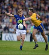 23 July 2016; Padraic Collins of Clare in action against John McManus of Roscommon during the GAA Football All-Ireland Senior Championship, Round 4A, game between Clare and Roscommon at Pearse Stadium in Salthill, Galway. Photo by Brendan Moran/Sportsfile