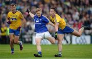 23 July 2016; Pádraic Collins of Clare in action against John McManus of Roscommon during the GAA Football All-Ireland Senior Championship, Round 4A, game between Clare and Roscommon at Pearse Stadium in Salthill, Galway. Photo by Brendan Moran/Sportsfile
