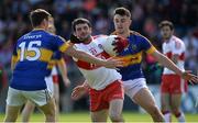 23 July 2016; Oisin Duffy of Derry in action against Conor Sweeney and Michael Quinlivan of Tipperary during their GAA Football All-Ireland Senior Championship, Round 4A, game at Kingspan Breffni Park in Co Cavan. Photo by Oliver McVeigh/Sportsfile