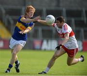 23 July 2016; Josh Keane of Tipperary in action against Ciaran McFaul of Derry during their GAA Football All-Ireland Senior Championship, Round 4A, game at Kingspan Breffni Park in Co Cavan. Photo by Oliver McVeigh/Sportsfile