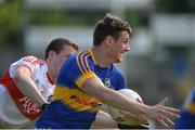 23 July 2016; Conor Sweeney of Tipperary in action against Brendan Rogers of Derry during their GAA Football All-Ireland Senior Championship, Round 4A, game at Kingspan Breffni Park in Co Cavan. Photo by Oliver McVeigh/Sportsfile