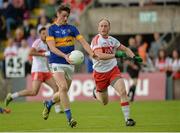 23 July 2016; Conor Sweeney of Tipperary in action against Ciaran Mullan of Derry during their GAA Football All-Ireland Senior Championship, Round 4A, game at Kingspan Breffni Park in Co Cavan. Photo by Oliver McVeigh/Sportsfile