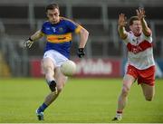 23 July 2016; Alan Campbell of Tipperary in action against Enda Lynn of Derry during their GAA Football All-Ireland Senior Championship, Round 4A, game at Kingspan Breffni Park in Co Cavan. Photo by Oliver McVeigh/Sportsfile