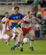 23 July 2016; Conor Sweeney of Tipperary in action against Ciaran Mullan of Derry during their GAA Football All-Ireland Senior Championship, Round 4A, game at Kingspan Breffni Park in Co Cavan. Photo by Oliver McVeigh/Sportsfile