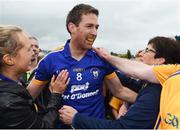 23 July 2016; Gary Brennan of Clare celebrates with supporters after victory in the GAA Football All-Ireland Senior Championship, Round 4A, game between Clare and Roscommon at Pearse Stadium in Salthill, Galway. Photo by Brendan Moran/Sportsfile