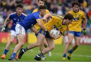 23 July 2016; David Murray of Roscommon is tackled by Dean Ryan of Clare during the GAA Football All-Ireland Senior Championship, Round 4A, game between Clare and Roscommon at Pearse Stadium in Salthill, Galway. Photo by Brendan Moran/Sportsfile