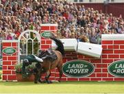 23 July 2016; Eoin McMahon of Ireland, competing on Kings Lux, fails to clear the wall during the The Land Rover Puissance at the Dublin Horse Show in the RDS, Ballsbridge, Dublin. Photo by Sam Barnes/Sportsfile