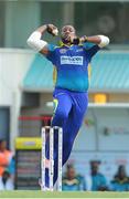 23 July 2016; Kieron Pollard bowls during Match 22 of the Hero Caribbean Premier League St Lucia Zouks v Barbados Tridents at the Daren Sammy Cricket Stadium in Gros Islet, St Lucia. Photo by Ashley Allen/Sportsfile