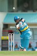 23 July 2016; Shane Watson strikes a six down the ground during Match 22 of the Hero Caribbean Premier League St Lucia Zouks v Barbados Tridents at the Daren Sammy Cricket Stadium in Gros Islet, St Lucia. Photo by Ashley Allen/Sportsfile