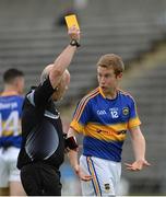 23 July 2016; Referee Marty Duffy issues Brian Fox of Tipperary a yellow card during the GAA Football All-Ireland Senior Championship, Round 4A, game at Kingspan Breffni Park in Co Cavan. Photo by Oliver McVeigh/Sportsfile