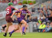12 September 2010; Una Lacey, Wexford, in action against Anne Marie Hayes, Galway. Gala All-Ireland Senior Camogie Championship Final, Galway v Wexford, Croke Park, Dublin. Picture credit: Oliver McVeigh / SPORTSFILE