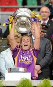 12 September 2010; Katrina Parrock, Wexford holds aloft the O'Duffy cup. Gala All-Ireland Senior Camogie Championship Final, Galway v Wexford, Croke Park, Dublin. Picture credit: Oliver McVeigh / SPORTSFILE