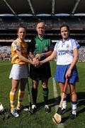 12 September 2010; Antrim captain Jane Adams, left, and Waterford captain Mairead Murphy with referee Donal Leahy before the game. Gala All-Ireland Junior Camogie Championship Final, Antrim v Waterford, Croke Park, Dublin. Photo by Sportsfile