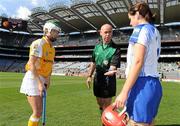 12 September 2010; Antrim captain Jane Adams, left, and Waterford captain Mairead Murphy with referee Donal Leahy during the coin toss. Gala All-Ireland Junior Camogie Championship Final, Antrim v Waterford, Croke Park, Dublin. Photo by Sportsfile