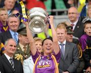 12 September 2010; Mary Lacey, Wexford, holds aloft the O'Duffy Cup. Gala All-Ireland Senior Camogie Championship Final, Galway v Wexford, Croke Park, Dublin. Picture credit: Oliver McVeigh / SPORTSFILE