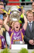 12 September 2010; Evelyn Quigley, Wexford, holds aloft the O'Duffy Cup. Gala All-Ireland Senior Camogie Championship Final, Galway v Wexford, Croke Park, Dublin. Picture credit: Oliver McVeigh / SPORTSFILE