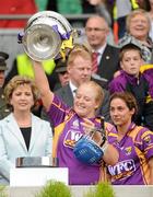 12 September 2010; Helena Jacob, Wexford, holds aloft the O'Duffy Cup. Gala All-Ireland Senior Camogie Championship Final, Galway v Wexford, Croke Park, Dublin. Picture credit: Oliver McVeigh / SPORTSFILE
