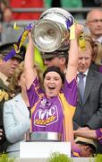 12 September 2010; Michelle O'Leary, Wexford, holds aloft the O'Duffy Cup. Gala All-Ireland Senior Camogie Championship Final, Galway v Wexford, Croke Park, Dublin. Picture credit: Oliver McVeigh / SPORTSFILE