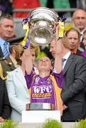 12 September 2010; Josie Dwyer, Wexford, holds aloft the O'Duffy Cup. Gala All-Ireland Senior Camogie Championship Final, Galway v Wexford, Croke Park, Dublin. Picture credit: Oliver McVeigh / SPORTSFILE