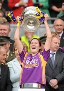 12 September 2010; Catherine O'Loughlin, Wexford, holds aloft the O'Duffy Cup. Gala All-Ireland Senior Camogie Championship Final, Galway v Wexford, Croke Park, Dublin. Picture credit: Oliver McVeigh / SPORTSFILE