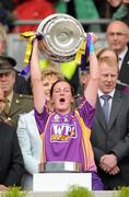 12 September 2010; Caroline Murphy, Wexford, holds aloft the O'Duffy Cup. Gala All-Ireland Senior Camogie Championship Final, Galway v Wexford, Croke Park, Dublin. Picture credit: Oliver McVeigh / SPORTSFILE