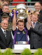 12 September 2010; Wexford manager JJ Doyle holds aloft the O'Duffy Cup. Gala All-Ireland Senior Camogie Championship Final, Galway v Wexford, Croke Park, Dublin. Picture credit: Oliver McVeigh / SPORTSFILE
