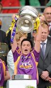 12 September 2010; Noleen Lambert, Wexford, holds aloft the O'Duffy Cup. Gala All-Ireland Senior Camogie Championship Final, Galway v Wexford, Croke Park, Dublin. Picture credit: Oliver McVeigh / SPORTSFILE