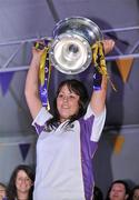 13 September 2010; Wexford's Una Lacey holds aloft the O'Duffy Cup at their homecoming as Gala All-Ireland Senior Camogie Champions, Wexford Quay, Wexford. Picture credit: Barry Cregg / SPORTSFILE
