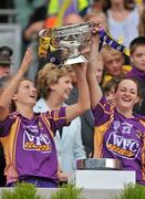 12 September 2010; Bridget Curran, left, and Shelley Kehoe, Wexford, lift the O'Duffy Cup. Gala All-Ireland Senior Camogie Championship Final, Galway v Wexford, Croke Park, Dublin. Picture credit: David Maher / SPORTSFILE