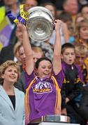 12 September 2010; Mary Leacy, Wexford, lifts the O'Duffy Cup. Gala All-Ireland Senior Camogie Championship Final, Galway v Wexford, Croke Park, Dublin. Picture credit: David Maher / SPORTSFILE