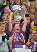 12 September 2010; Deirdre Codd, Wexford, lifts the O'Duffy Cup. Gala All-Ireland Senior Camogie Championship Final, Galway v Wexford, Croke Park, Dublin. Picture credit: David Maher / SPORTSFILE