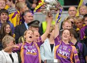 12 September 2010; Bridget Curran and Shelley Kehoe, Wexford, holds aloft the O'Duffy cup. Gala All-Ireland Senior Camogie Championship Final, Galway v Wexford, Croke Park, Dublin. Picture credit: Oliver McVeigh / SPORTSFILE