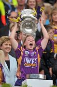 12 September 2010; Evelyn Quigley, Wexford, lifts the O'Duffy Cup. Gala All-Ireland Senior Camogie Championship Final, Galway v Wexford, Croke Park, Dublin. Picture credit: David Maher / SPORTSFILE