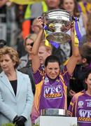 12 September 2010; Fiona Kavanagh, Wexford, lifts the O'Duffy Cup. Gala All-Ireland Senior Camogie Championship Final, Galway v Wexford, Croke Park, Dublin. Picture credit: David Maher / SPORTSFILE
