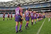 12 September 2010; Wexford and Galway players during the parade before the start of the game. Gala All-Ireland Senior Camogie Championship Final, Galway v Wexford, Croke Park, Dublin. Picture credit: David Maher / SPORTSFILE
