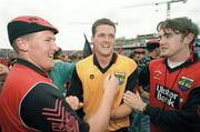 14 August 1994; Down's Gary Mason celebrates with supporters after the game. Bank of Ireland Football Championship Semi-Final, Down v Cork, Croke Park, Dublin. Picture credit: David Maher / SPORTSFILE