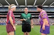 12 September 2010; Referee Karl O'Brien, centre, with Galway captain Therese Maher, left, and Wexford captain Una Lacey during the coin toss. Gala All-Ireland Senior Camogie Championship Final, Galway v Wexford, Croke Park, Dublin. Picture credit: Oliver McVeigh / SPORTSFILE