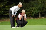 15 September 2010; Mark Holmes, Naas Golf Club, Co. Kildare, and his mother Kate, who was his caddie for the round, line up a putt on the 7th hole during the Bulmers Junior Cup Semi-Final. Bulmers Cups and Shields Finals 2010, Castlebar Golf Club, Co. Mayo. Picture credit: Ray McManus / SPORTSFILE