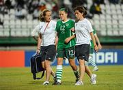 13 September 2010; Stacie Donnelly, Republic of Ireland, is assisted off the pitch by physiotherapist Ursula Brooks and team doctor Suzi Clarke. FIFA U-17 Women’s World Cup Group Stage, Republic of Ireland v Ghana, Dwight Yorke Stadium, Scarborough, Tobago, Trinidad & Tobago. Picture credit: Stephen McCarthy / SPORTSFILE