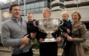 16 September 2010; RTE Radio commentator Michéal O Muircheartaigh holds on to the Sam Maguire Cup with grandsons twins Eoghan, left, and Liam, aged 2, along with Dominic Wilkinson and daughter Neasa during a press conference to raise funds for the Cormac McAnallen Trust which go directly to screening services and the purchase of defibrillators to help combat Sudden Adult Death Syndrome. The campaign hopes to have 100,000 texts to the number 53306 in the Republic of Ireland and 81108 in Northern Ireland, by full-time in Sunday's All-Ireland Senior Football Final between Down and Cork, which will be O Muircheartaigh's final commentary at a GAA Football All-Ireland Championship Final before his retirement. Micheal O'Muircheartaigh Press Conference, Croke Park Hotel, Jones's Road, Dublin. Picture credit: Barry Cregg / SPORTSFILE