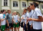 16 September 2010; Republic of Ireland players, from left, Clare Shine, Grace Moloney and Denise O'Sullvian speak with school children on a visit to St. Joseph's Convent ahead of their side's FIFA U-17 Women’s World Cup Quarter-Final, against Japan, tomorrow. Republic of Ireland at the FIFA U-17 Women’s World Cup - Thursday 16th September, St. Joseph's Convent, Port of Spain, Trinidad, Trinidad & Tobago. Picture credit: Stephen McCarthy / SPORTSFILE