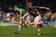 24 July 2016; Ciarán O’Connor of Limerick in action against Mark O’Neill of Wexford during the Electric Ireland GAA Hurling All-Ireland Minor Championship quarter final match between Wexford and Limerick at Semple Stadium in Thurles, Co Tipperary. Photo by Ray McManus/Sportsfile