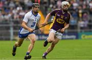 24 July 2016; Jamie Barron of Waterford in action against David Dunne of Wexford during the GAA Hurling All-Ireland Senior Championship quarter final match between Wexford and Waterford at Semple Stadium in Thurles, Co Tipperary. Photo by Ray McManus/Sportsfile