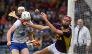24 July 2016; Diarmuid O’Keeffe of Wexford in action against Shane Bennett of Waterford during the GAA Hurling All-Ireland Senior Championship quarter final match between Wexford and Waterford at Semple Stadium in Thurles, Co Tipperary. Photo by Ray McManus/Sportsfile