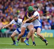 24 July 2016; Conor McDonald of Wexford in action against Jamie Barron of Waterford during the GAA Hurling All-Ireland Senior Championship quarter final match between Wexford and Waterford at Semple Stadium in Thurles, Co Tipperary. Photo by Stephen McCarthy/Sportsfile