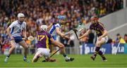 24 July 2016; Michael Walsh and Shane Bennett, left, of Waterford in action against Liam Ryan, 17, and Diarmuid O’Keeffe of Wexford during the GAA Hurling All-Ireland Senior Championship quarter final match between Wexford and Waterford at Semple Stadium in Thurles, Co Tipperary. Photo by Ray McManus/Sportsfile