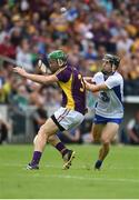 24 July 2016; Jamie Barron of Waterford in action against Matthew O'Hanlon of Wexford during the GAA Hurling All-Ireland Senior Championship quarter final match between Wexford and Waterford at Semple Stadium in Thurles, Co Tipperary. Photo by Daire Brennan/Sportsfile